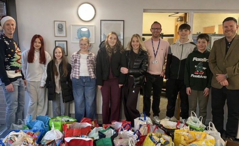 Eckington School students and staff with their record donations to local Eckington Foodbank